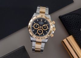 Rolex Daytona 126503 (Unknown (random serial)) - Black dial 40 mm Gold/Steel case
