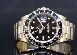Rolex GMT-Master II 16718 (1997) - Zwart wijzerplaat 40mm Geelgoud