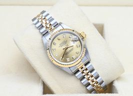 Rolex Lady-Datejust 69173 (1996) - Champagne wijzerplaat 26mm Goud/Staal