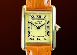 Cartier Tank 5057001 (1990) - Champagne dial 20 mm Gold/Steel case