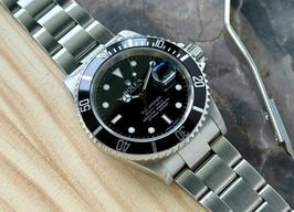 Rolex Submariner Date 16610T (2009) - Zwart wijzerplaat 40mm Staal