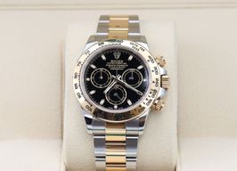 Rolex Daytona 116503 (Unknown (random serial)) - Black dial 40 mm Gold/Steel case