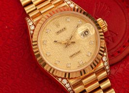 Rolex Lady-Datejust 69238 (1995) - Champagne wijzerplaat 26mm Geelgoud