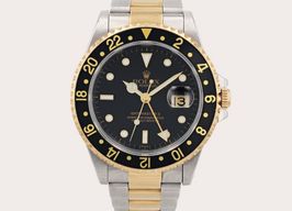 Rolex GMT-Master II 16713 (1994) - Black dial 40 mm Gold/Steel case