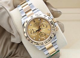 Rolex Daytona 116503 (Unknown (random serial)) - Champagne dial 40 mm Gold/Steel case