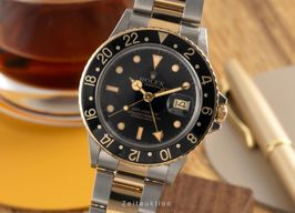 Rolex GMT-Master 16753 (1985) - Black dial 40 mm Gold/Steel case