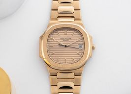 Patek Philippe Nautilus 3900 (1984) - Champagne dial 33 mm Yellow Gold case