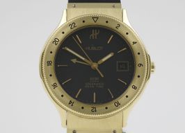 Hublot Greenwich Mean Time 1570.3 (1997) - Black dial 36 mm Yellow Gold case