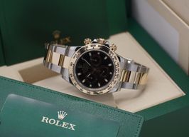 Rolex Daytona 116503 (2021) - Black dial 40 mm Gold/Steel case
