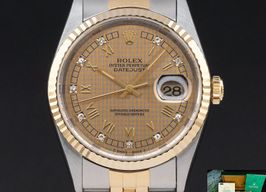 Rolex Datejust 36 16233 (1995) - Champagne wijzerplaat 36mm Goud/Staal
