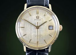 Omega Seamaster 136.020 (1965) - Champagne dial 34 mm Gold/Steel case
