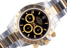 Rolex Daytona 16523 (1995) - Black dial 40 mm Gold/Steel case