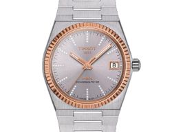 Tissot Unknown T931.207.41.336.00 (2026) - Grey dial 35 mm Gold/Steel case
