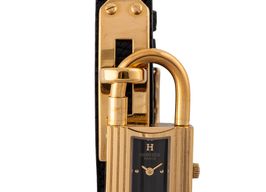 Hermès Kelly KE1.210 (1995) - Black dial 21 mm Gold/Steel case
