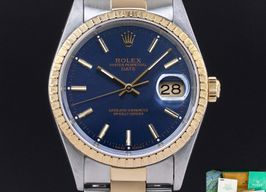 Rolex Oyster Perpetual Date 15223 (1993) - Blauw wijzerplaat 34mm Goud/Staal