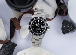 Rolex Submariner Date 16610 (1997) - Zwart wijzerplaat 40mm Staal