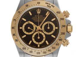 Rolex Daytona 16523 (1995) - Zwart wijzerplaat 40mm Goud/Staal