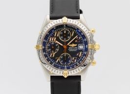 Breitling Chronomat B13350 (2002) - Black dial 40 mm Gold/Steel case