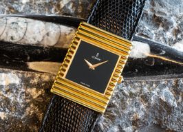 Corum Vintage 57342 (1970) - Black dial 24 mm Yellow Gold case