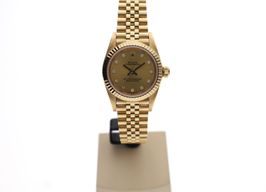 Rolex Oyster Perpetual 76198 (2006) - Champagne wijzerplaat 24mm Geelgoud