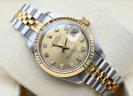 Rolex Lady-Datejust 69173 (1990) - Champagne wijzerplaat 26mm Goud/Staal