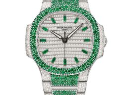 Patek Philippe Nautilus 7118/1453G-001 (Unknown (random serial)) - Diamond dial 35 mm White Gold case