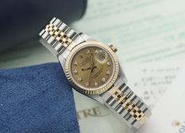 Rolex Lady-Datejust 69173 (1988) - Champagne wijzerplaat 26mm Goud/Staal