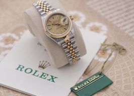 Rolex Lady-Datejust 69173 (1991) - Champagne wijzerplaat 26mm Goud/Staal