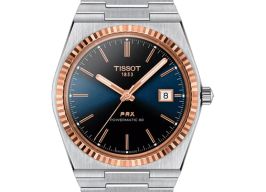 Tissot Unknown T931.407.41.041.00 (2026) - Blue dial 40 mm Gold/Steel case