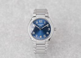 Patek Philippe World Time Chronograph 5935A-001 (2018) - Roze wijzerplaat 41mm Staal