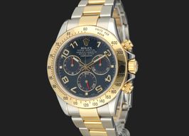 Rolex Daytona 116523 (2011) - Blue dial 40 mm Gold/Steel case