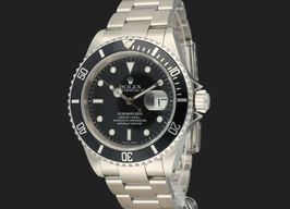 Rolex Submariner Date 16610 (2002) - Zwart wijzerplaat 40mm Staal