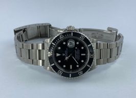 Rolex Submariner Date 16610 (Unknown (random serial)) - Black dial 40 mm Steel case