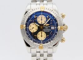 Breitling Chronomat Evolution B13356 (2004) - Zwart wijzerplaat 44mm Goud/Staal
