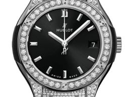 Hublot Classic Fusion Quartz 581.NX.1470.RX.1704 (2026) - Zwart wijzerplaat 33mm Titanium