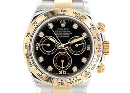 Rolex Daytona 116503 (Unknown (random serial)) - Black dial 40 mm Gold/Steel case