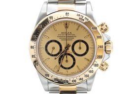 Rolex Daytona 16523 (Onbekend (willekeurig serienummer)) - Champagne wijzerplaat 40mm Goud/Staal