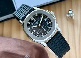Patek Philippe Aquanaut 5064 (1999) - Brown dial 36 mm Steel case