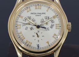 Patek Philippe Annual Calendar 5035J-001 (Unknown (random serial)) - White dial 37 mm Yellow Gold case