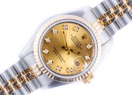 Rolex Lady-Datejust 69173 (1991) - Champagne wijzerplaat 26mm Goud/Staal