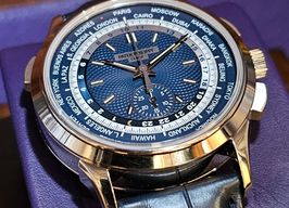 Patek Philippe World Time Chronograph 5930G-010 (2022) - Blauw wijzerplaat 39mm Witgoud