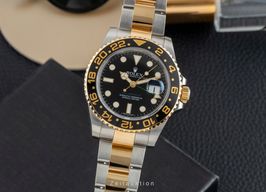 Rolex GMT-Master II 116713LN (Unknown (random serial)) - Black dial 40 mm Gold/Steel case