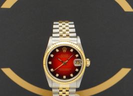 Rolex Datejust 31 68273 (1989) - Rood wijzerplaat 31mm Goud/Staal