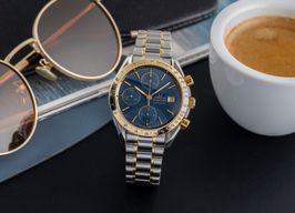 Omega Speedmaster Date 3311.80.00 (Unknown (random serial)) - Blue dial 39 mm Gold/Steel case