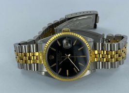 Rolex Datejust 36 - (Unknown (random serial)) - Black dial 36 mm Gold/Steel case