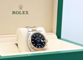 Rolex Datejust 36 116233 (Unknown (random serial)) - Blue dial 36 mm Gold/Steel case
