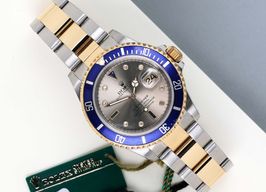 Rolex Submariner Date 16613LB (1999) - Blauw wijzerplaat 40mm Goud/Staal