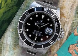 Rolex Submariner Date 16610 (1995) - Zwart wijzerplaat 40mm Staal