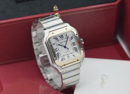 Cartier Santos W2SA0006 (2019) - White dial 40 mm Gold/Steel case
