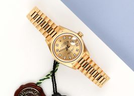 Rolex Lady-Datejust 69178 (1990) - Champagne dial 26 mm Yellow Gold case